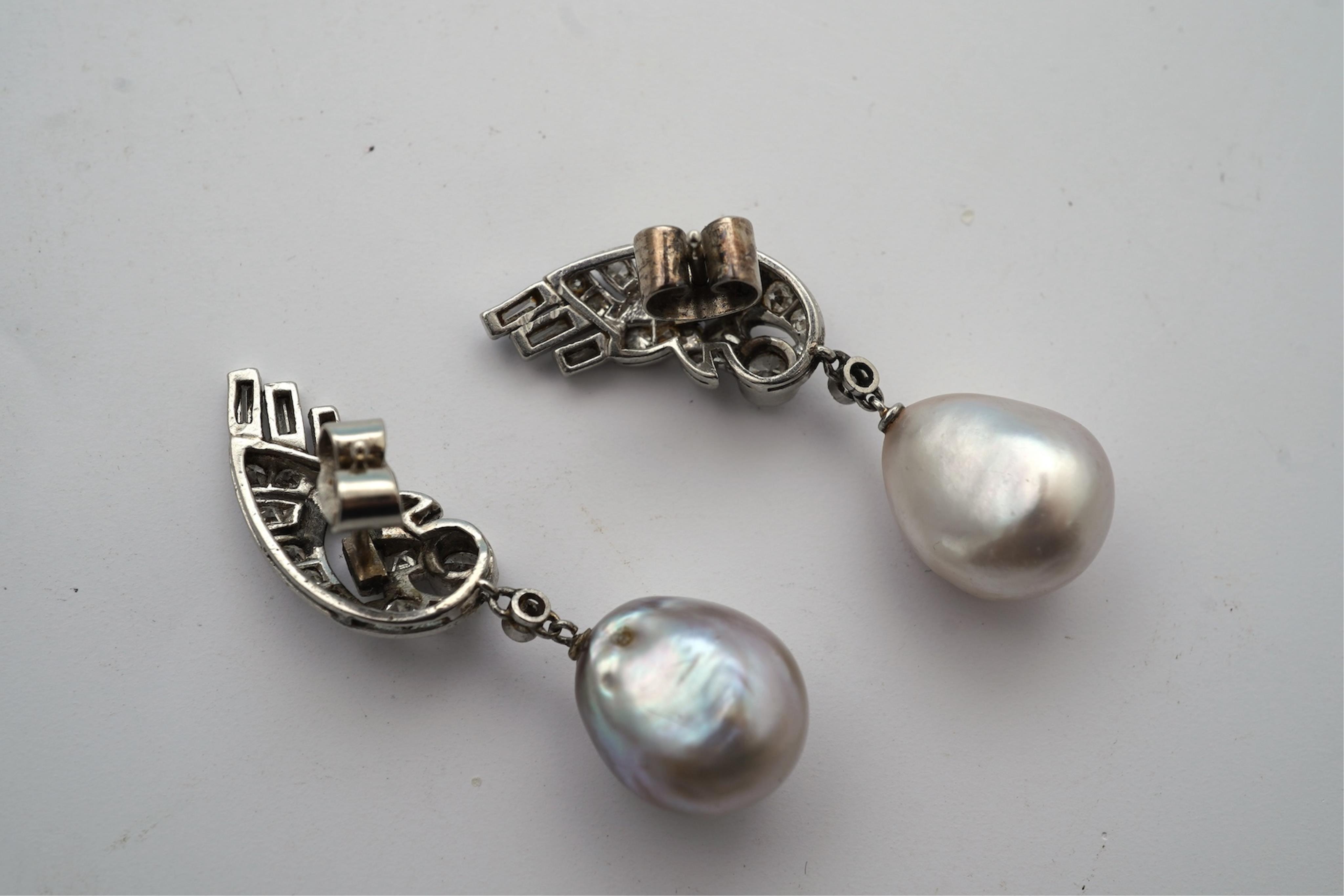 A fine pair of Art Deco natural pearl and diamond earrings, 1930s